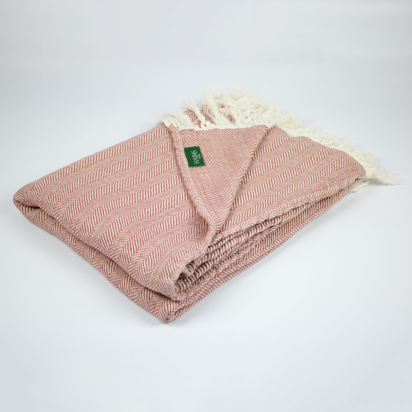 Baumwolldecke mit feinem Fischgrätmuster - vielseitig und kuschelig
